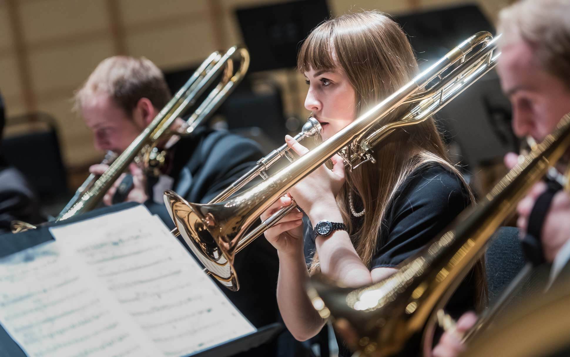 A student of UBC's School of Music plays a trombone at a public recital